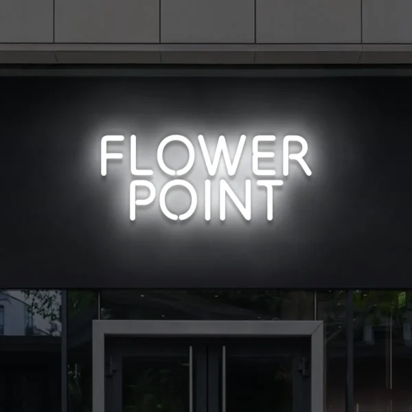 Biały neon LED Flower Point na fasadzie – elegancka reklama świetlna